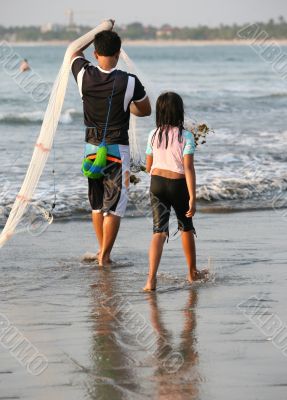 Man fishing in a sunset