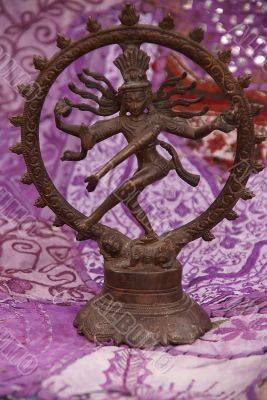 Bronze Shiva on purple