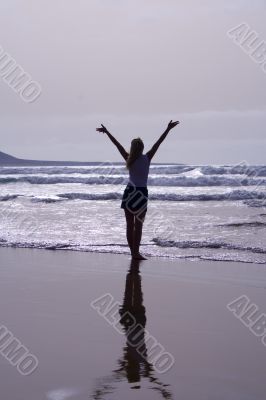 WOMAN LOOKING AT SEA
