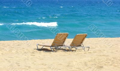 Chaise lounges on a beach