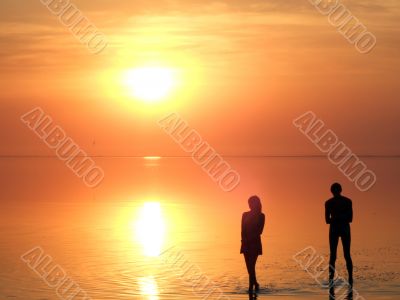 A black silhouette of a children on a sunset 2