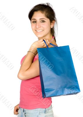 beautiful teenager with shopping bags