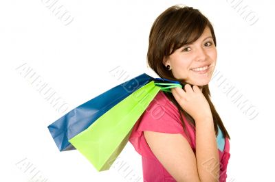 beautiful teenager with shopping bags