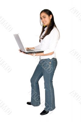 girl standing with a laptop