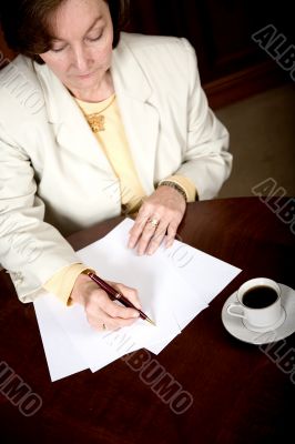 Business woman doing paperwork