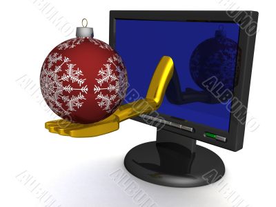 Christmas toy on a hand, put out from the monitor.