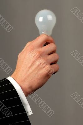 hand an electric lamp