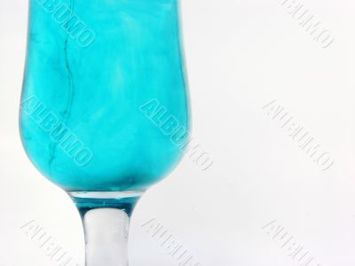 glass with blue water