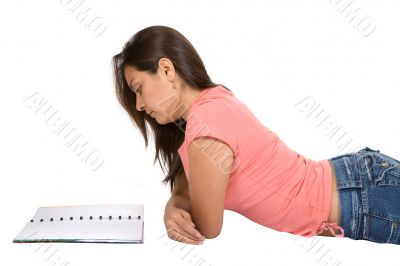 student studying on the floor
