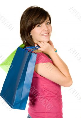beautiful teenager with shopping bags