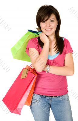beautiful teenager with shopping bags