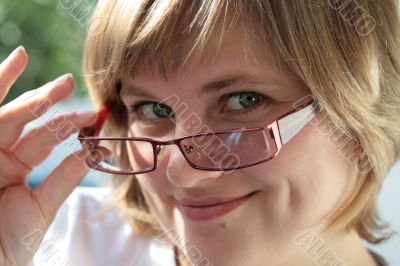 a nice portrait of young woman with glasses