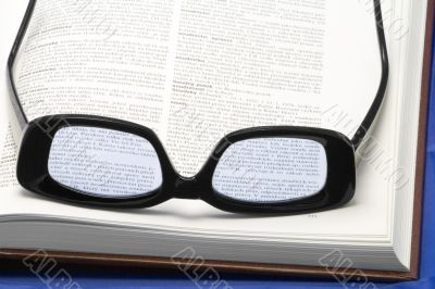 Glasses on a book
