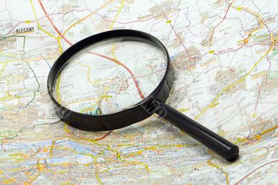 Handglass on a map
