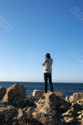 a man standing on a rock