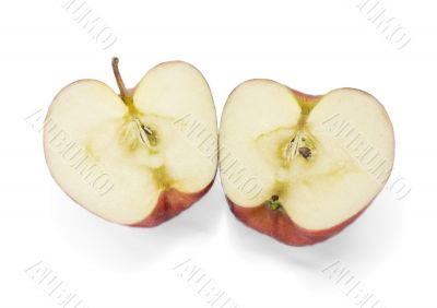Two halfs of cur red apple