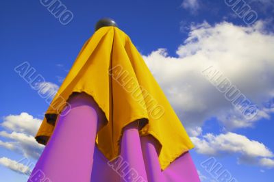 umbrella under clouds