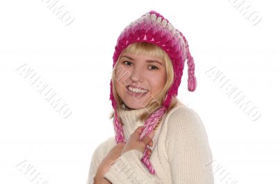 Smiling blond girl in cap