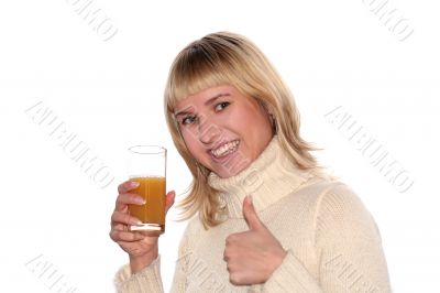 Smiling girl with Glass of juice and good idea gesture