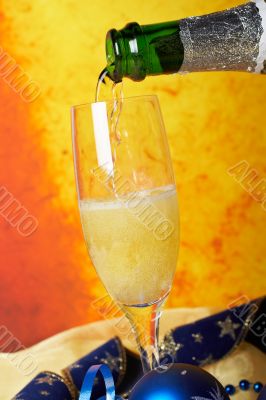 Pouring champagne on glass