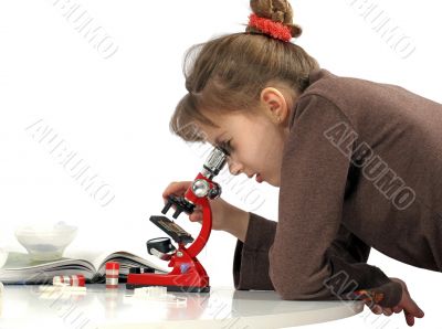 Girl and microscope