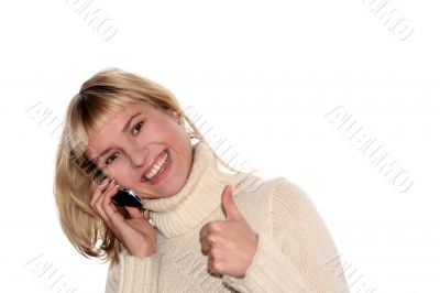 Smiling girl with mobile phone with good idea gesture