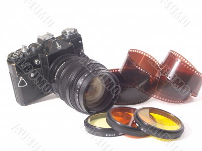 camera,lens and film on white background