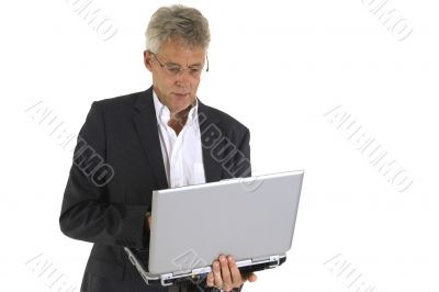 Senior working with laptop