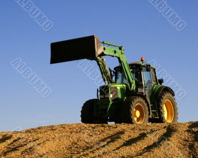 Tractor on corn