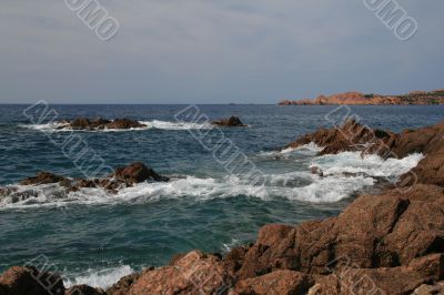 Rocks by the heavy sea