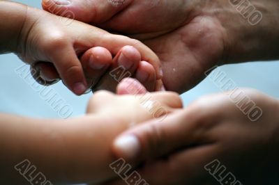 child  and father hands