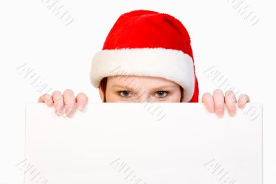 Christmas girl holding up a white sign