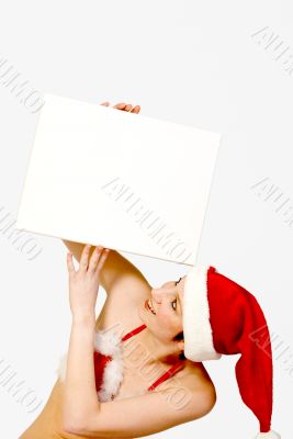 Christmas girl holding up a white sign