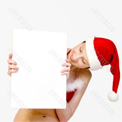 Christmas girl holding up a white sign