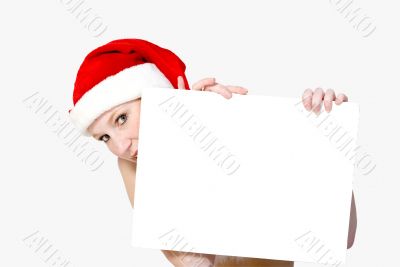 Christmas girl holding up a white sign