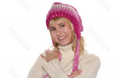 Smiling blond girl in cap