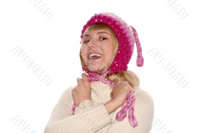 Smiling blond girl in cap