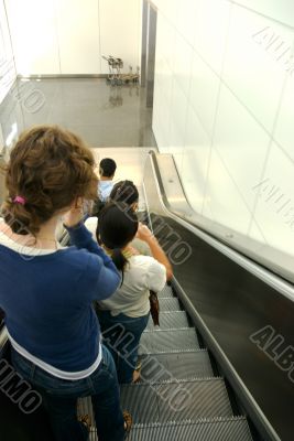 people on an escalator