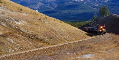 Freight train hauling up the Rocky Mountains
