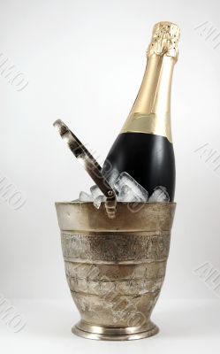 Champagne in an old silver ice bucket isolated