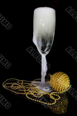 glass of  champagne and christmas decoration