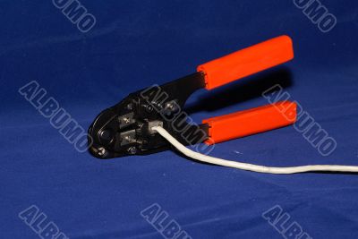 RJ-45 crimping tool with cable cat. 5