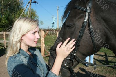 Blond female model with brown horse portrait