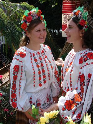 Two ukrainian girls in folk costumes