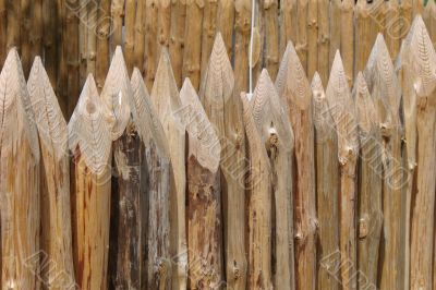 wooden sharp logs palings barrier wall