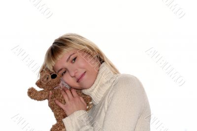 blond female with teddy bear