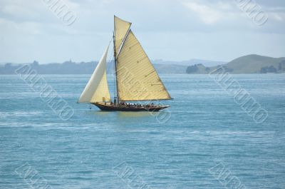 Vacation under vintage sails of leisure yacht