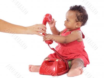 Baby girl with phone