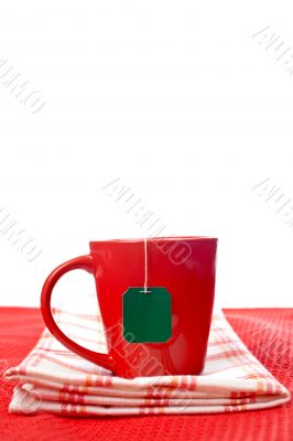 Red cup with tea-bag