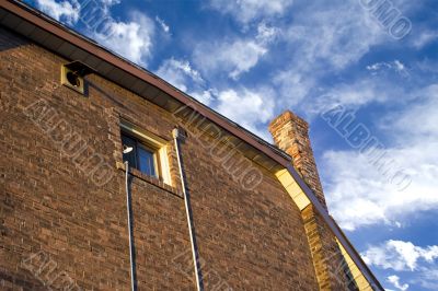 Roofs and clouds on sunset 5